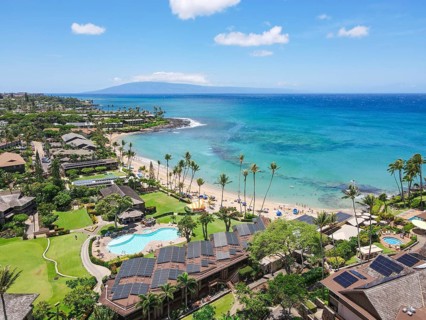 Aerial view of tropical destination with white sand and turquoise water. Kapalua coast in Maui,