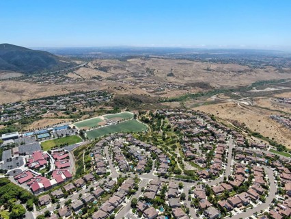 Aerial view of suburban neighborhood with big mansions in San Diego, California, USA. Aerial view