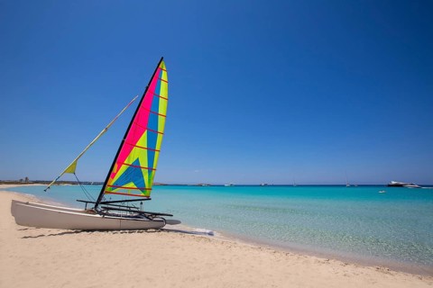 Catamaran sailboat in Illetes beach of Formentera at Balearic Islands