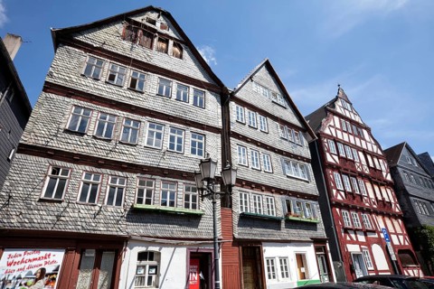 Restored and not yet restored houses, Kornmarkt grain market, historic old town of Herborn, Hesse,