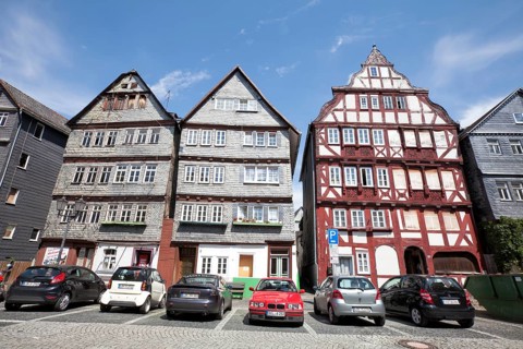 Restored and not yet restored houses, Kornmarkt grain market, historic old town of Herborn, Hesse,