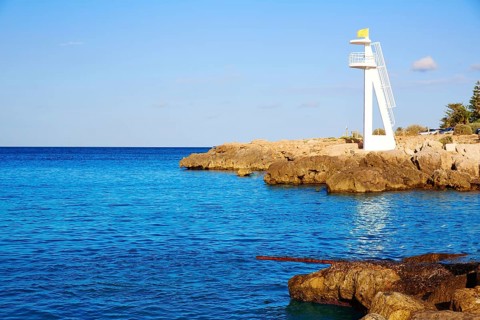 Denia Las Rotas Trampoli beach and tower in Mediterranean Spain Alicante