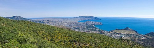 Panorama of the Black Sea coast, a view from the Perchem mountain on the resort town of Sudak and