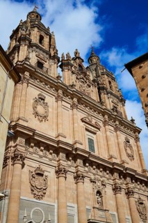 Salamanca Clerecia church and Casa Conchas shell house in Spain