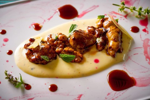 Lamb gizzard recipe on a cream modern cuisine presentation