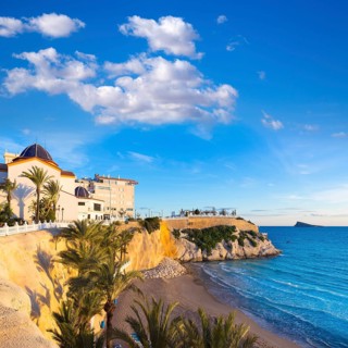 Benidorm Alicante playa del Mal Pas beach at sunset in Spain with palm trees