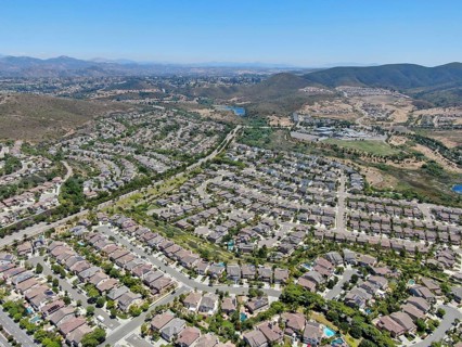 Aerial view of suburban neighborhood with big mansions in San Diego, California, USA. Aerial view