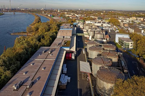 Stainless steel tanks storing chemicals at the Rhine river in Germany. The Chemicals are being