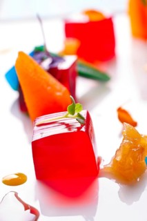 Jelly colorful fruits gelatine on white background