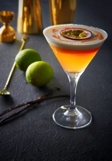 Mango cocktail with lemon and passion fruit maracuya