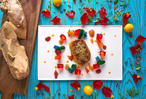 Foie slice with grated white truffle and colorful jelly decoration