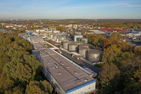 Stainless steel tanks storing chemicals at the Rhine river in Germany. The Chemicals are being