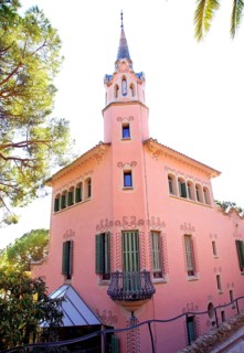Barcelona house of Gaudi in Park Guell pink facade building
