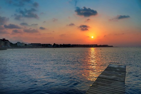 Denia beach sunset dusk in Mediterranean at Alicante Spain