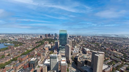 Panoramic aerial view of Boston financial district, historic center, Beacon Hill and Charles River