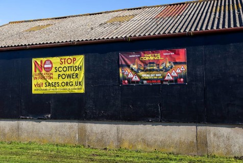 Protest campaign banners against Scottish Power and National Grid proposed electricity substation