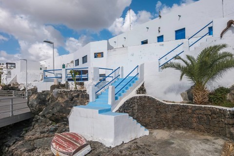 Typical white houses on the promenade of Puerto del Carmen, Lanzarote, Canary Islands, Spain,