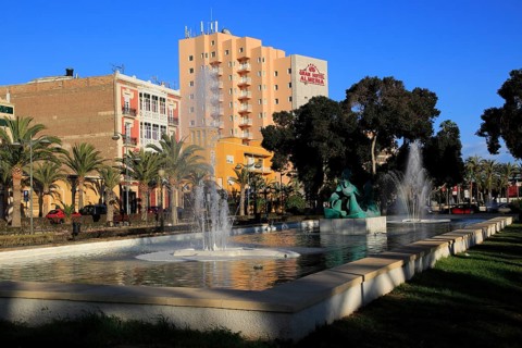 Water fountain in small park garden near Gran Hotel Almeria in the city centre of Almeria, Spain,