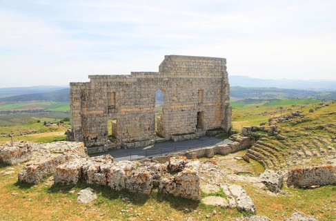 Remains of Roman theatre stage background wall and seating area, Acinipo Roman town site Ronda la