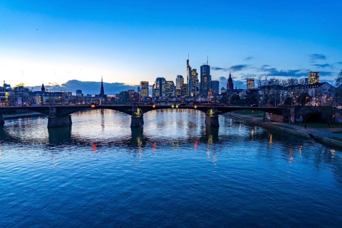 Skyline of the city centre of Frankfurt am Main, river Main, dusk, Ignatz-Bubis-Brücke, Hesse,