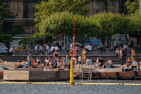 Summer, swimming in the harbour of Copenhagen, there are official bathing places, harbour baths and