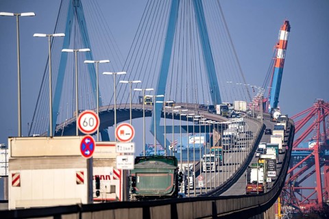 Traffic on the Köhlbrand Bridge in the port of Hamburg, spans the 325 m wide Köhlbrand, an arm of