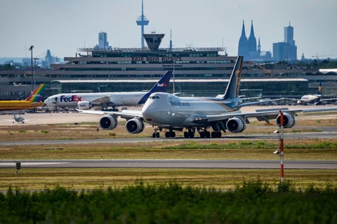 Cologne-Bonn Airport, CGN, UPS cargo aircraft, Boeing 747 jumbo jet, on landing, tower at the