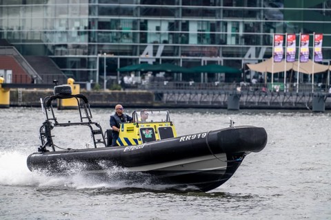 Rijkswaterstaat speedboat on the IJ, Amsterdam Netherlands
