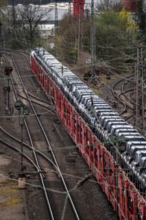 Freight train, car train with Landrover new cars on the goods train line at the Hagen-Vorhalle