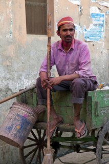 Indian garbage man on wooden cart in Vrindavan, Uttar Pradesh, India, Asia