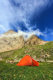 Tent at the foot of a rock face, Buneset, Moskenesöya, Lofoten, Nordland, Norway, Norway, Europe
