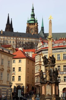 View of St Vitus Cathedral and the castle complex from Lesser Town Square with the Holy Trinity