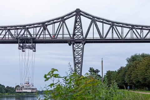 High bridge, transporter bridge, cyclist, Kiel Canal, Rendsburg, Schleswig-Holstein, Germany,