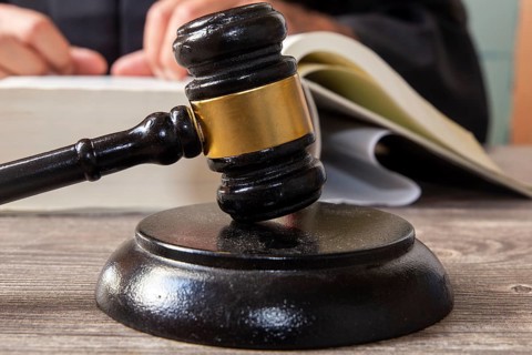 Close-up of a judge's gavel as a symbolic image for a court judgement