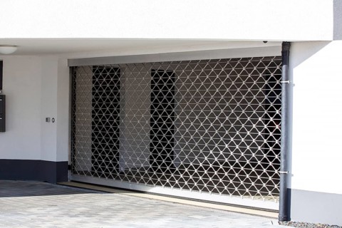 Roller shutter door at the entrance to the underground car park of a residential complex