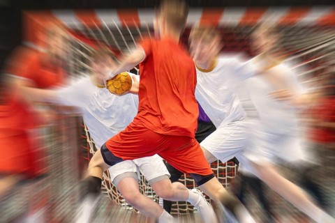 Handball-Symbol: Wild-Szene bei einem Handballspiel