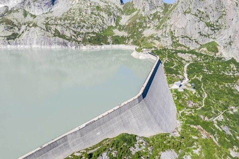 Dam of reservoir Lake Albigna near village Vicosoprano, Bergell, Switzerland, Europe