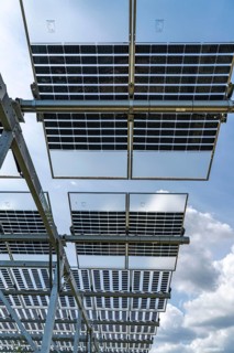 Agri-photovoltaic test plant, an apple orchard with two different systems of PV modules was roofed