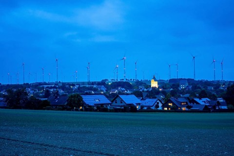 Wind farm above the village of Lichtenau, self-proclaimed energy town, houses with photovoltaic
