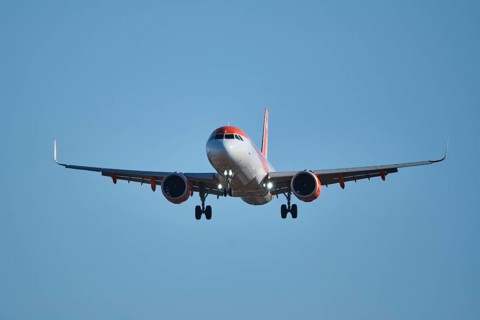 Lisbon, Portugal - September 2, 2023: easyJet Airbus A320-214 passenger plane descends to land in