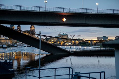 Partial collapse of the Carola Bridge in Dresden with the Semper Opera House in the background,