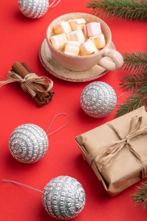 Christmas or New Year composition. Decorations, box, cinnamon, silver balls, fir and spruce