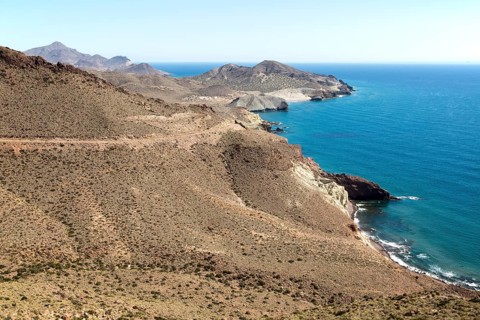 Coastal landscape Cabo de Gata natural park, looking east towards San Jose, Almeria, Spain, Europe