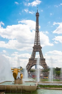 Eiffel Tower, Tour Eiffel, behind a fountain with sculpture, statue Taureau et Daim (Bull and