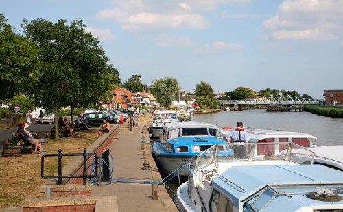 Leisure boats on the River Yare at Reedham, Norfolk Broads, England, United Kingdom, Europe