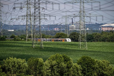 Railway line between Essen and Bochum near Wattenscheid, RRX Rhine-Ruhr Express, regional train,