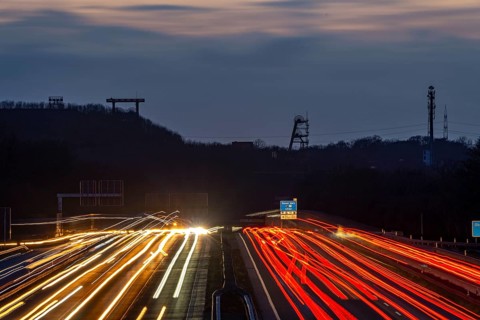 Evening traffic on the A2 motorway at the Recklinghausen junction heading west, in the background