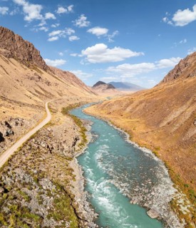 Mountain valley with wild river between hills, Bolgart Valley, Naryn Province, Kyrgyzstan, Asia