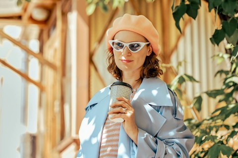 Urban portrait of cute modern stylish woman
