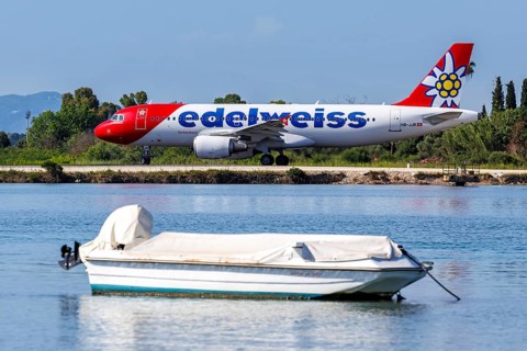 An Edelweiss Airbus A320 aircraft with the registration HB-JJK at Corfu Airport, Greece, Europe